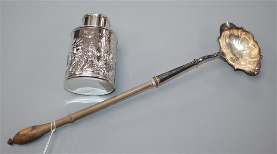 A George II silver toddy ladle by David Hennell I, London, 1749 and a late Victorian silver tea caddy.